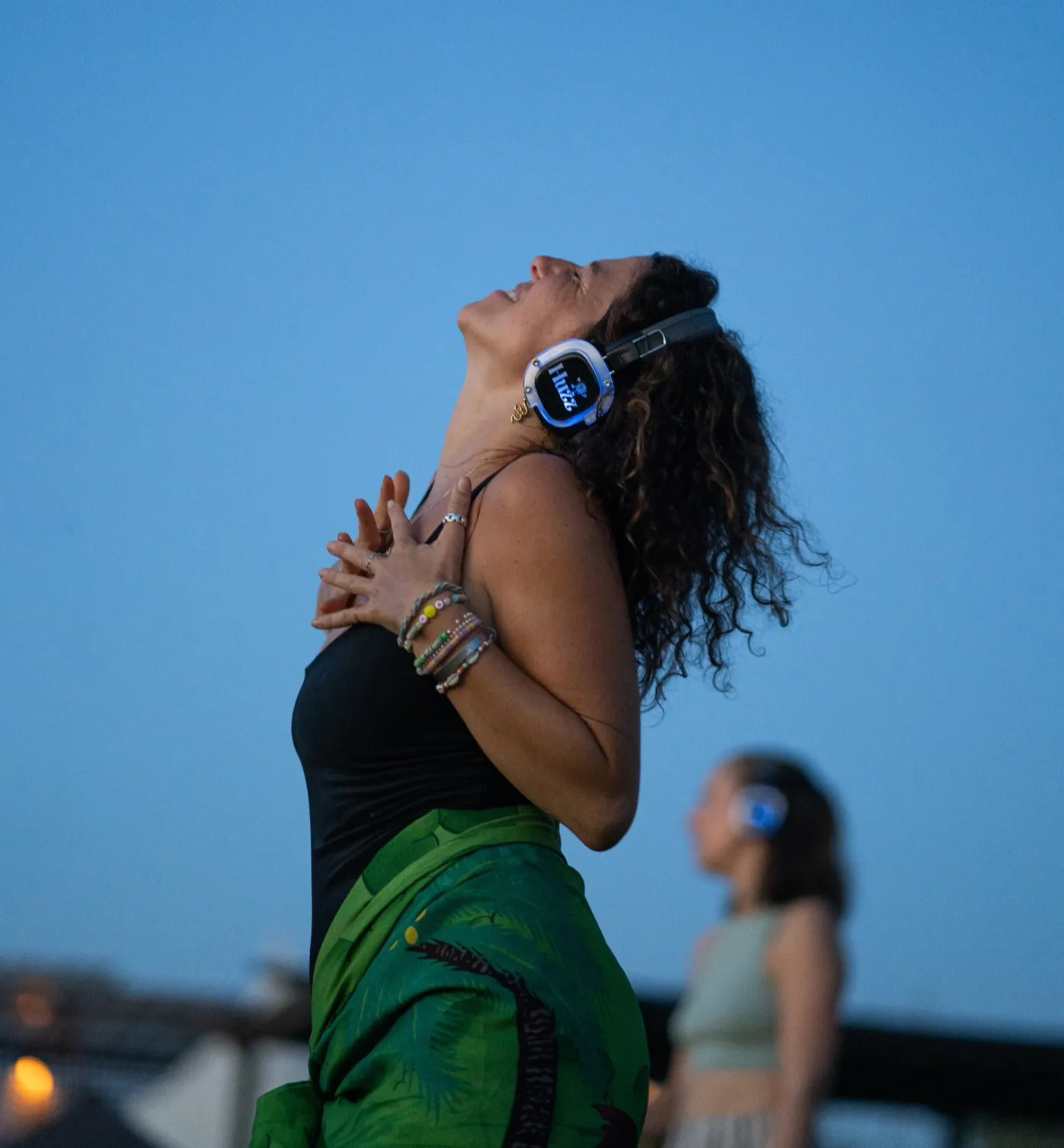 Premium silent disco headphones with glowing LED lights in red, green, and blue