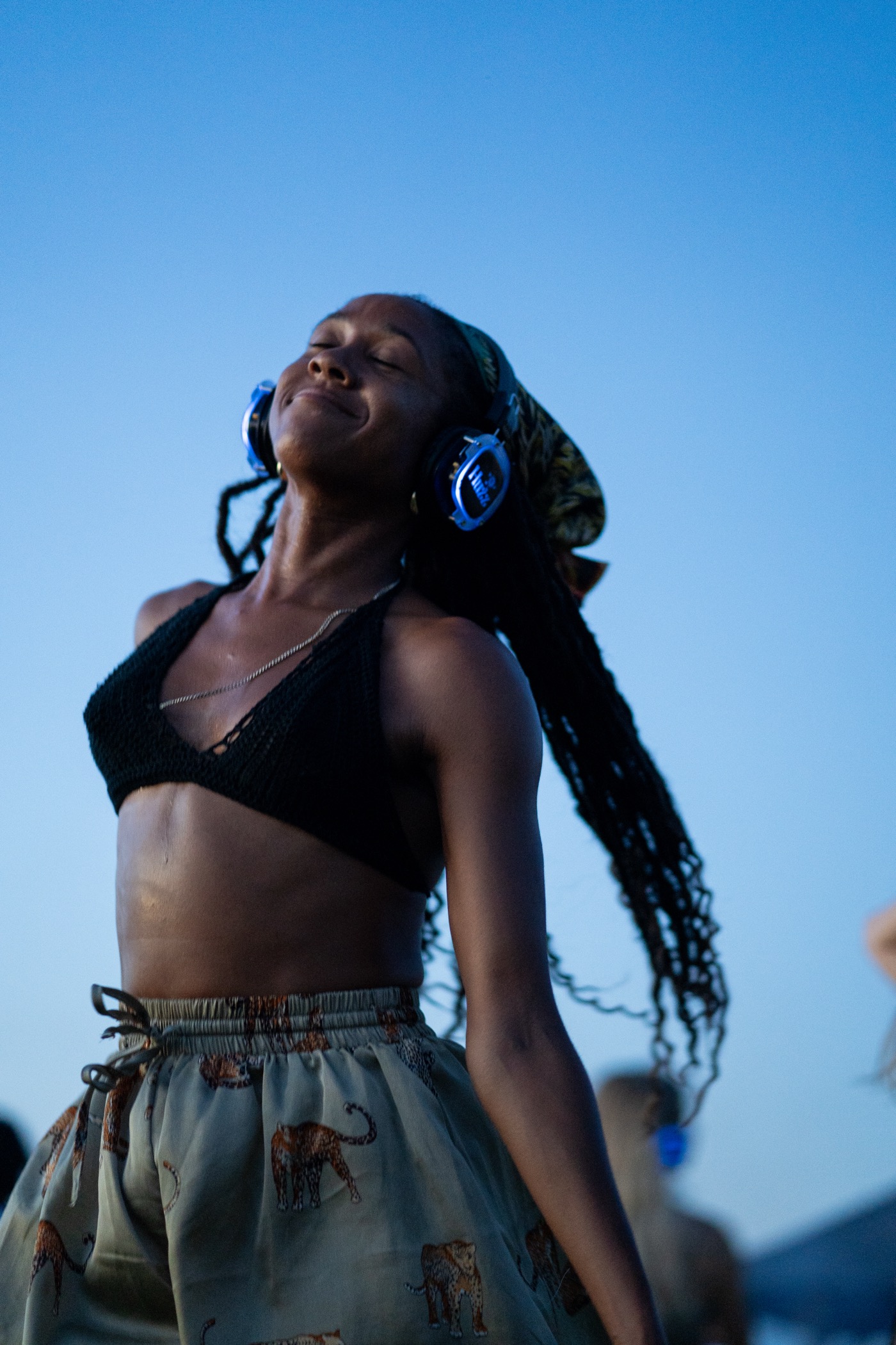 Beach dance with silent disco headphones