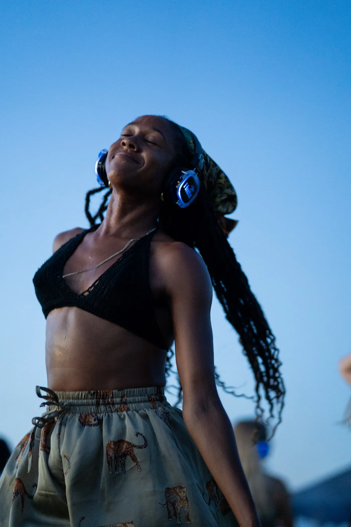 Silent disco headphones at a beach dance party event